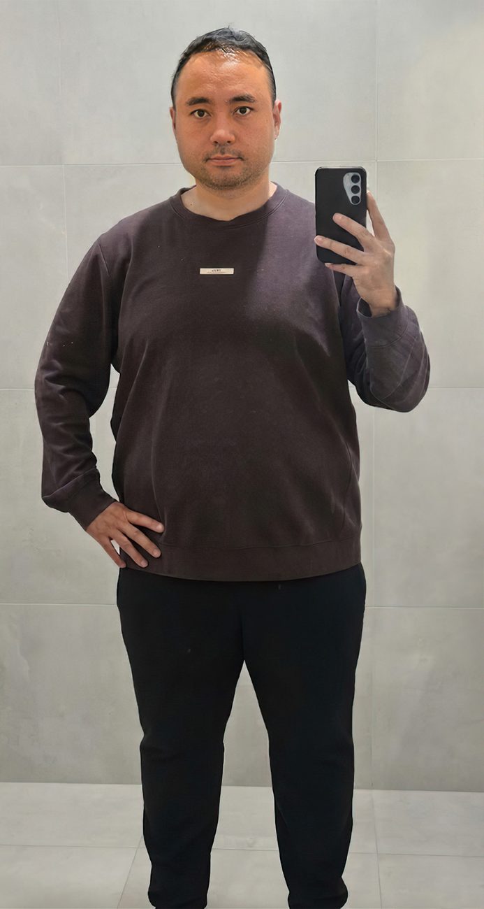 Before: full length in a loose jumper
