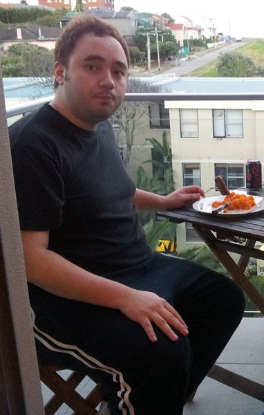 Before: eating a meal on a balcony