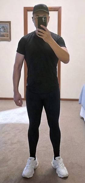 Now: full length in black activewear and white sneakers